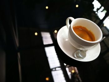 High angle view of coffee cup on table