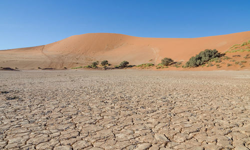 Scenic view of sossusvlei in namib desert against clear blue sky, namibia