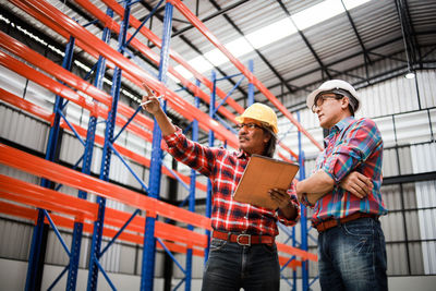 Full length of men working