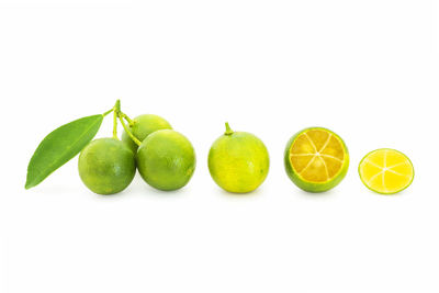 Close-up of fruits against white background