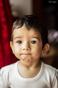 Portrait of cute boy at home