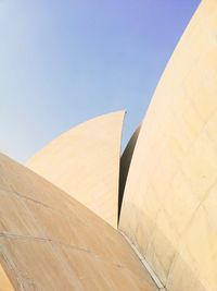 Low angle view of building against blue sky