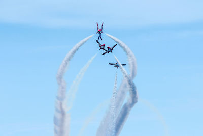 Vapor trail against clear blue sky