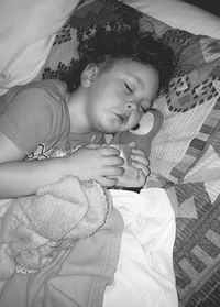 Woman sleeping on a bed