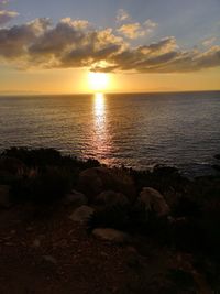 Scenic view of sea against sky during sunset