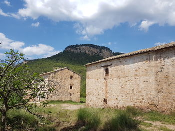 Old building against cloudy sky