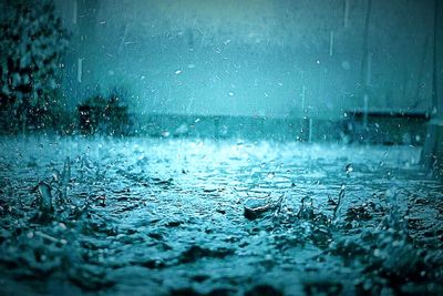 Close-up of water drops on table