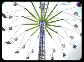 Low angle view of amusement park ride