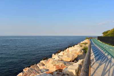 Scenic view of sea against blue sky