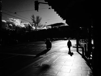 Full length of woman walking in city