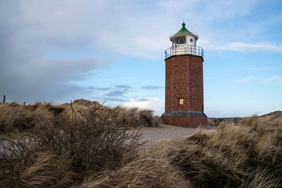 Panoramic image of kampen lighthouse against blue sky, sylt, north frisia, germany