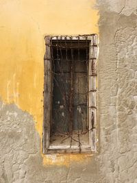 Close-up of weathered wall of old building