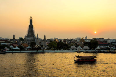 View of buildings against sky during sunset