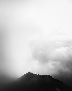 Low angle view of silhouette mountain against sky