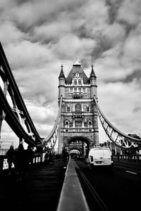 View of bridge against cloudy sky