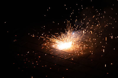 Firework display at night