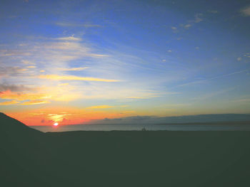 Scenic view of dramatic sky over sea