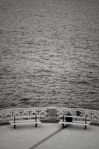 High angle view of text on pier over sea
