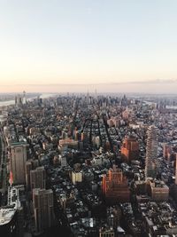 High angle view of city against sky during sunset