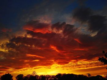 Low angle view of dramatic sky during sunset