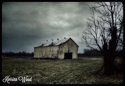 House on field against sky