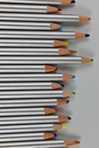 Close-up of colored pencils on table