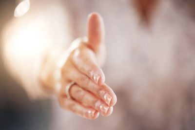 Cropped hand of woman