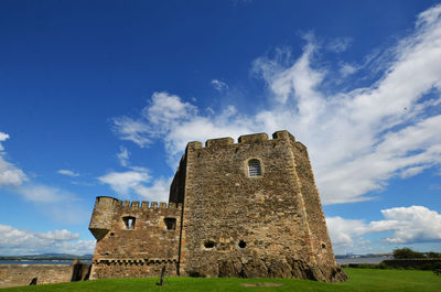 Low angle view of fort against sky