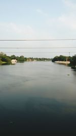 View of river against cloudy sky