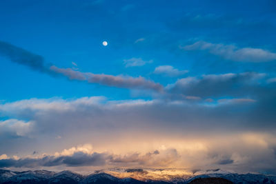 Low angle view of mountains against sky during sunset