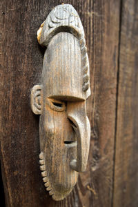 Close-up of carving on wooden door