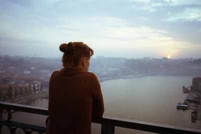 Silhouette of woman looking at view