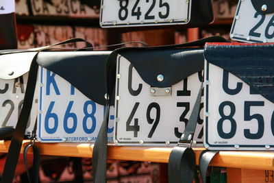 Close-up of numbers on placards