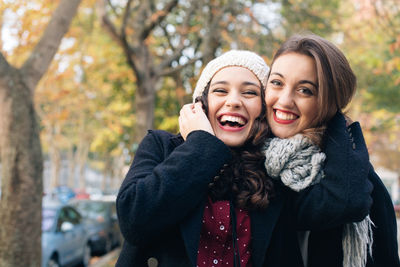 Portrait of smiling young woman in winter