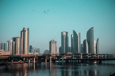 View of modern buildings against clear sky