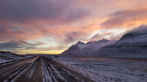 Scenic view of dramatic landscape during sunset