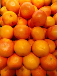 Full frame shot of oranges at market stall