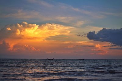 Scenic view of sea at sunset