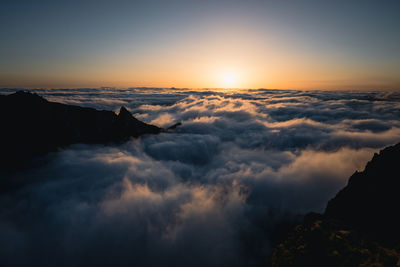 Sunrise above sea of clouds, pico do arieiro, madeira, portugal