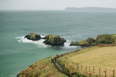 High angle view of rocks in sea