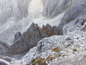 Scenic view of snow covered rock