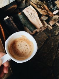 High angle view of coffee cup on table