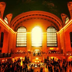 Crowd at illuminated railroad station