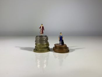 Stack of toy on table against white background