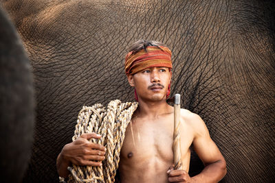 Portrait of shirtless man