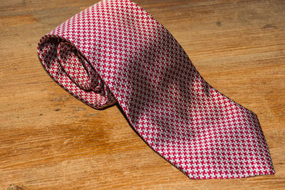 Close-up of necktie on table