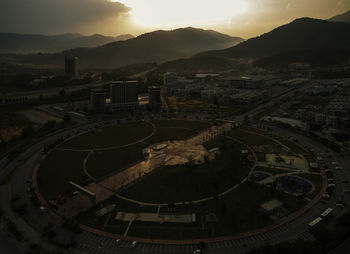 High angle view of cityscape against sky during sunset