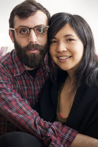 Portrait of happy couple at home