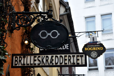 Low angle view of information sign on building