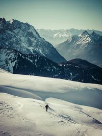 Scenic view of snow covered mountains